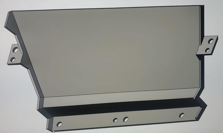 CAD rendering of injection-molded center console delete plate with integrated mounting tabs